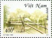 Log bridge with handrail