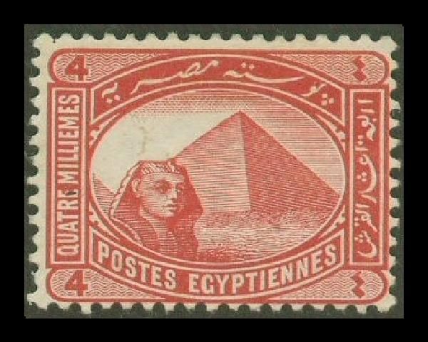 Sphinx in front of Cheops pyramid