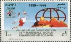 Mascot with ball, Sphinx, pyramids, globe