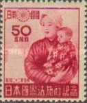 Mother with Child, Diet Building in Background