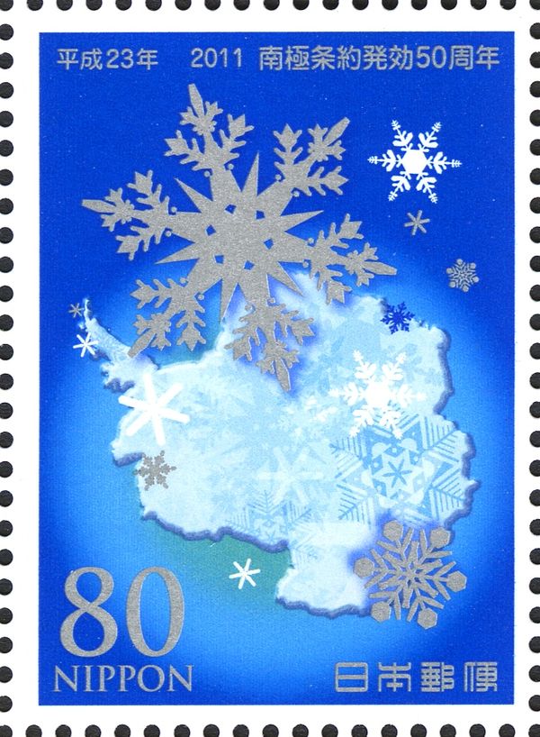 Crystal Snowflakes Surrounding Map of Antarctica