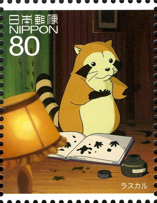 Rascal the Racoon with Book and Lamp