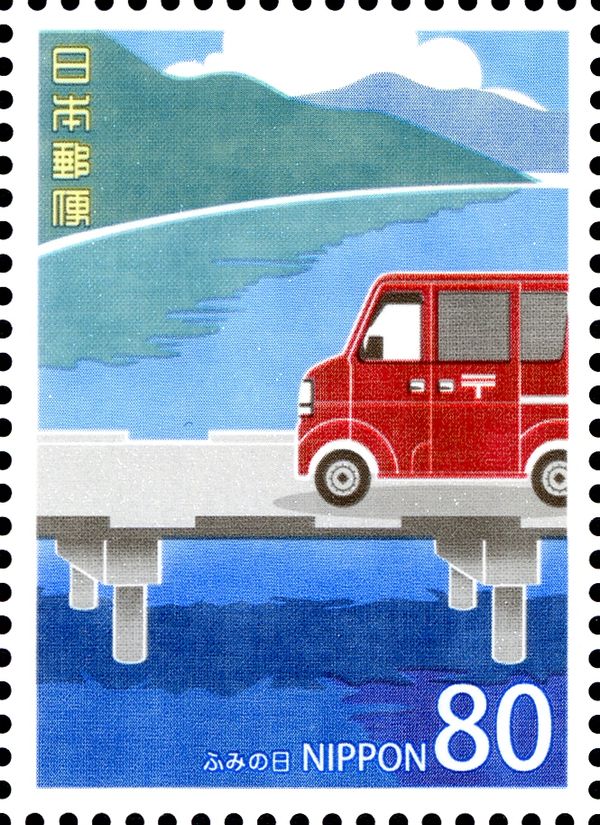 A postal truck running by the river