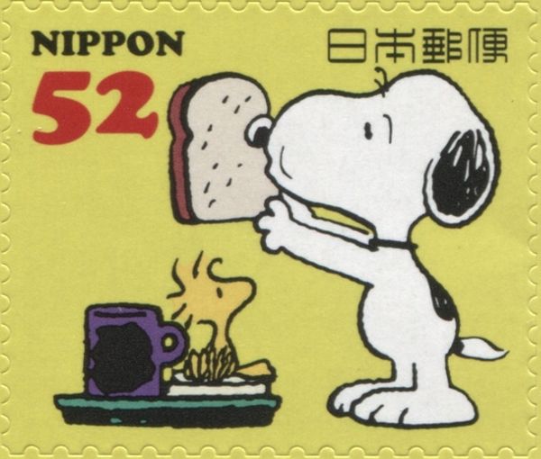 Snoopy Holding Bread near Woodstock