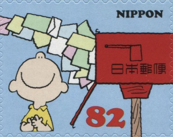 Charlie Brown with Stream of Letters and Mailbox