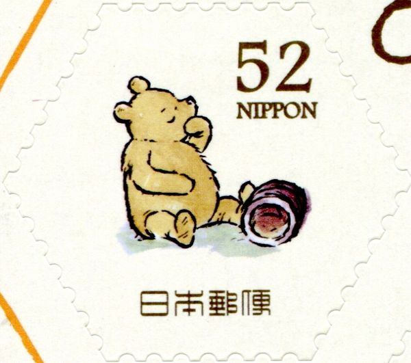 Winnie the Pooh beside Overturned Honey Jar