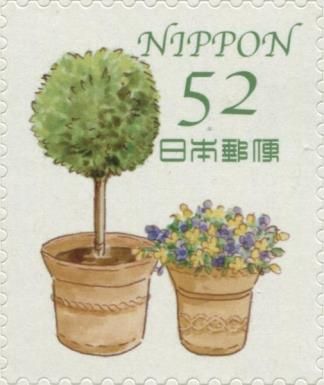 Potted Tree and Flowers