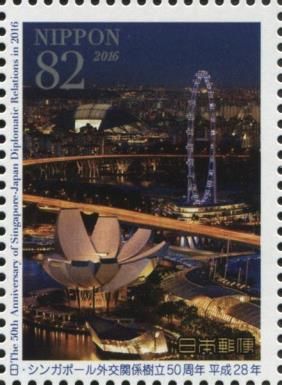 Singapore Flyer Ferris Wheel and ArtScience Museum at Night
