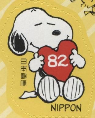 Snoopy Hugs a Heart