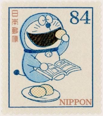 Doraemon Reading Manga While Eating