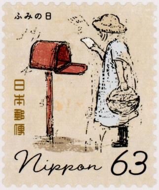 Woman with Letter in Front of Mailbox