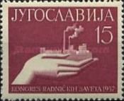 Hand with a Model of a Factory