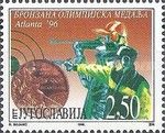 Bronze medal and shooter figure