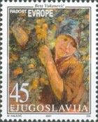 A girl under a fruit tree