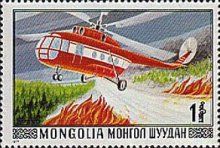 Helicopter fighting fire on steppe