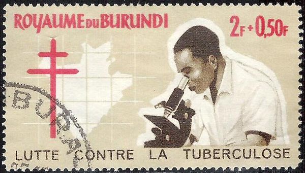 Scientist with Microscope and Map of Burundi