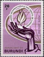 Human rights flame, hand and globe