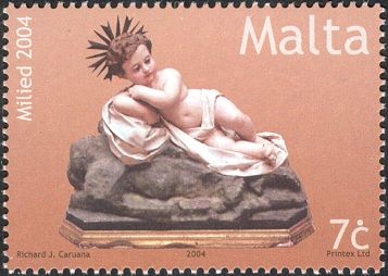 Papier mache Bambino on rocks