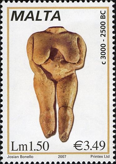Clay statuette of female figure