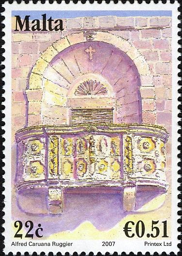 Ornate open stone balcony and recessed doorway, Gozo