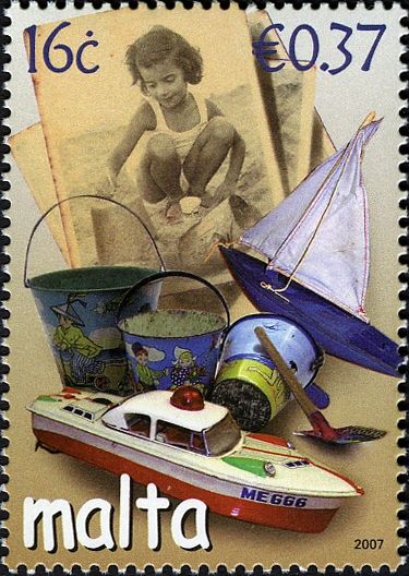 Japanese tin cabin cruiser (1960s), sand pail, spade & Trian