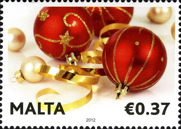 Christmas baubles and gold ribbon