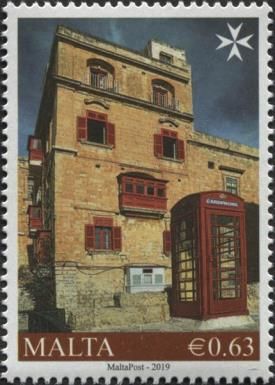 Building in Valletta and telephone box