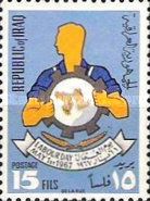 Emblem of the labour is held by worker