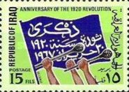 Flag with inscription, raised arms with blunt weapons