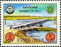 Dam, emblems of the Conference and the Commission