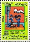 Iraqi young pioneers with national flag