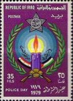 Burning candle, laurel wreath