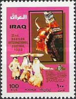 Decorated bull, dancers