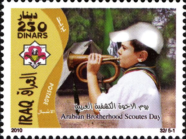 Boy playing on a trumpet