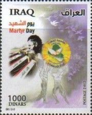 Screaming man in front of flag-decorated coffins, men lift e