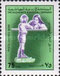 Boy talking to Bank teller.
