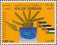 Summit Emblem and Jordanian flags