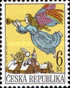 Angel with trumpet over village