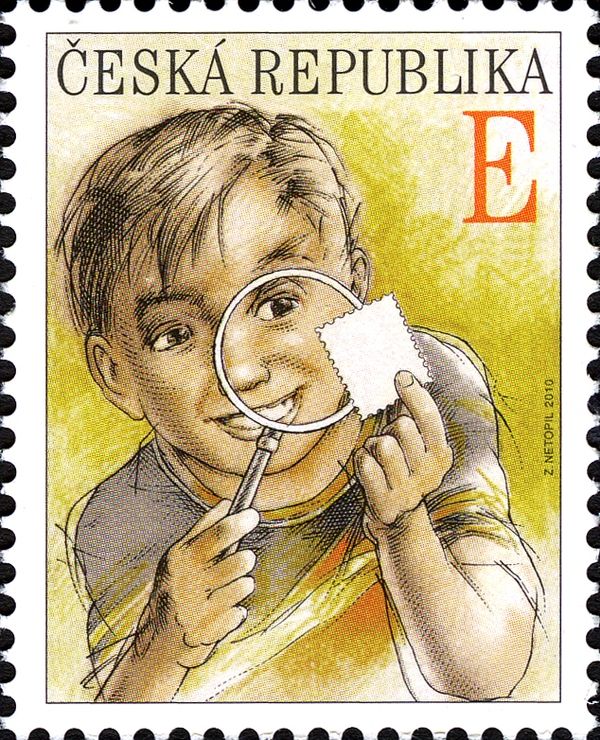 Boy with magnifying glass