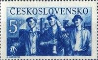 Three workers leaving factory