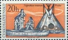 Indians, canoe and tepee