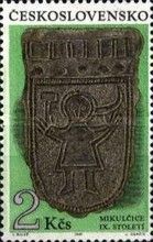 Gilt strap ornament with human figure (9th cent.)