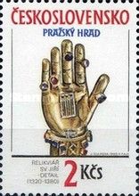 Gold and jeweled hand