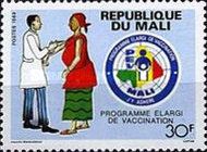 Emblem and Woman Being Vaccinated