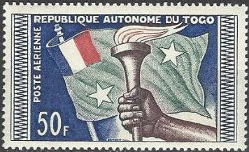 Torch and flag from France and Togo