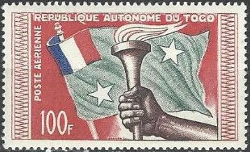 Torch and flag from France and Togo