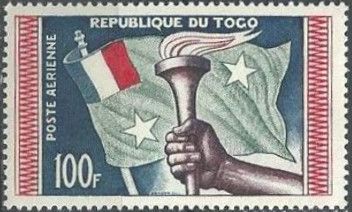 Torch and flag from France and Togo