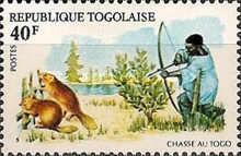 Beaver hunter with bow and arrow