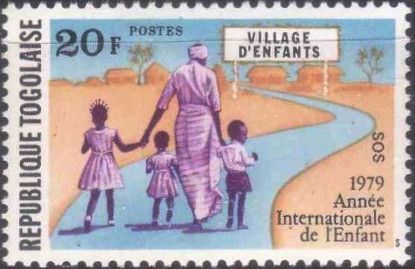 MOM driving her children to the village of children