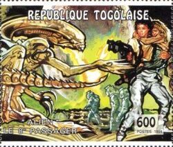 Humans in combat with creature
